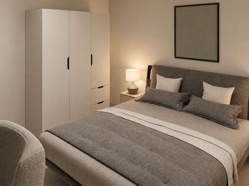 Quarto da fração H, com cama de casal e roupeiro branco