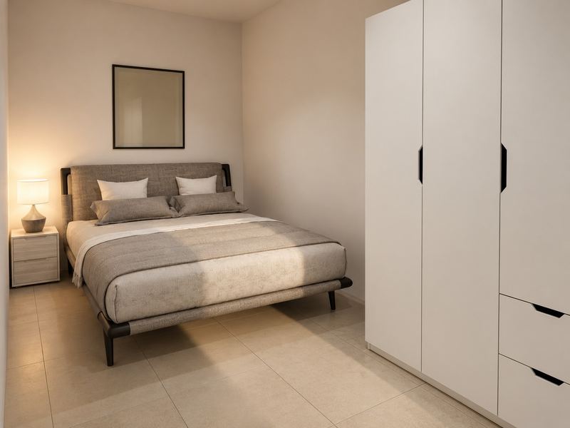 Quarto da fração W, com cama de casal e roupeiro